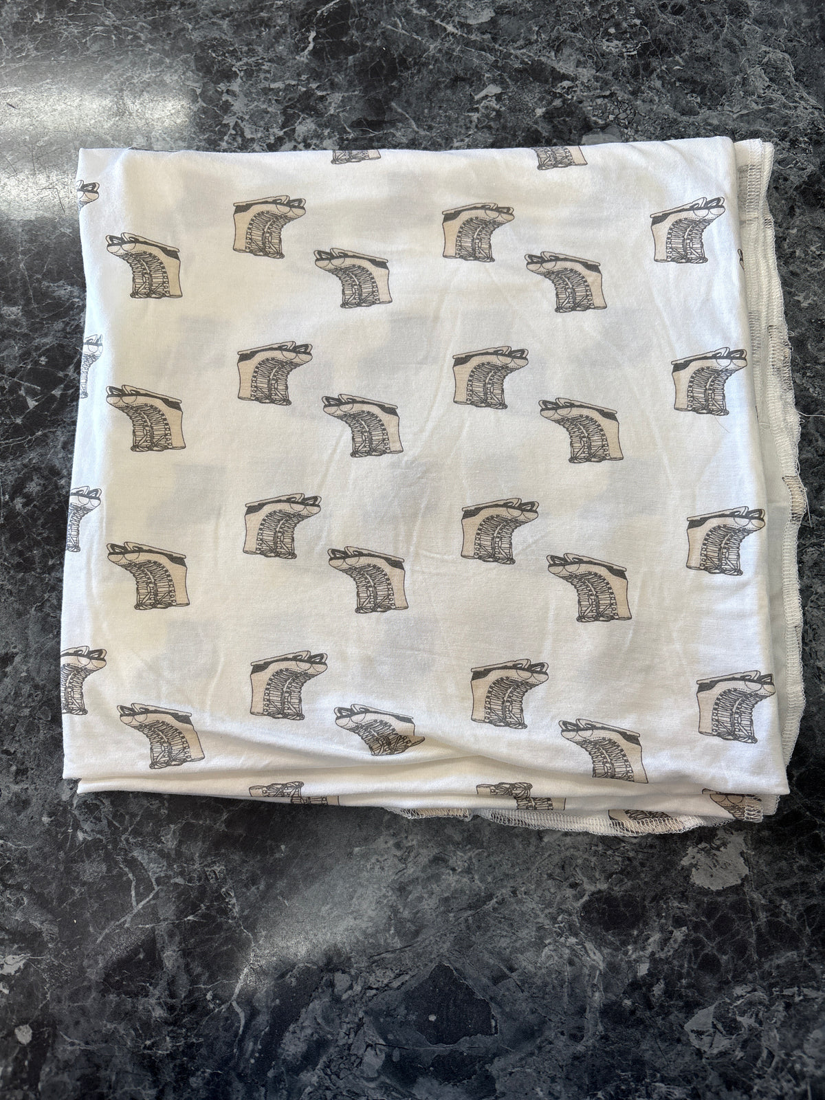 Kate Quinn Ice Skate Swaddle Blanket