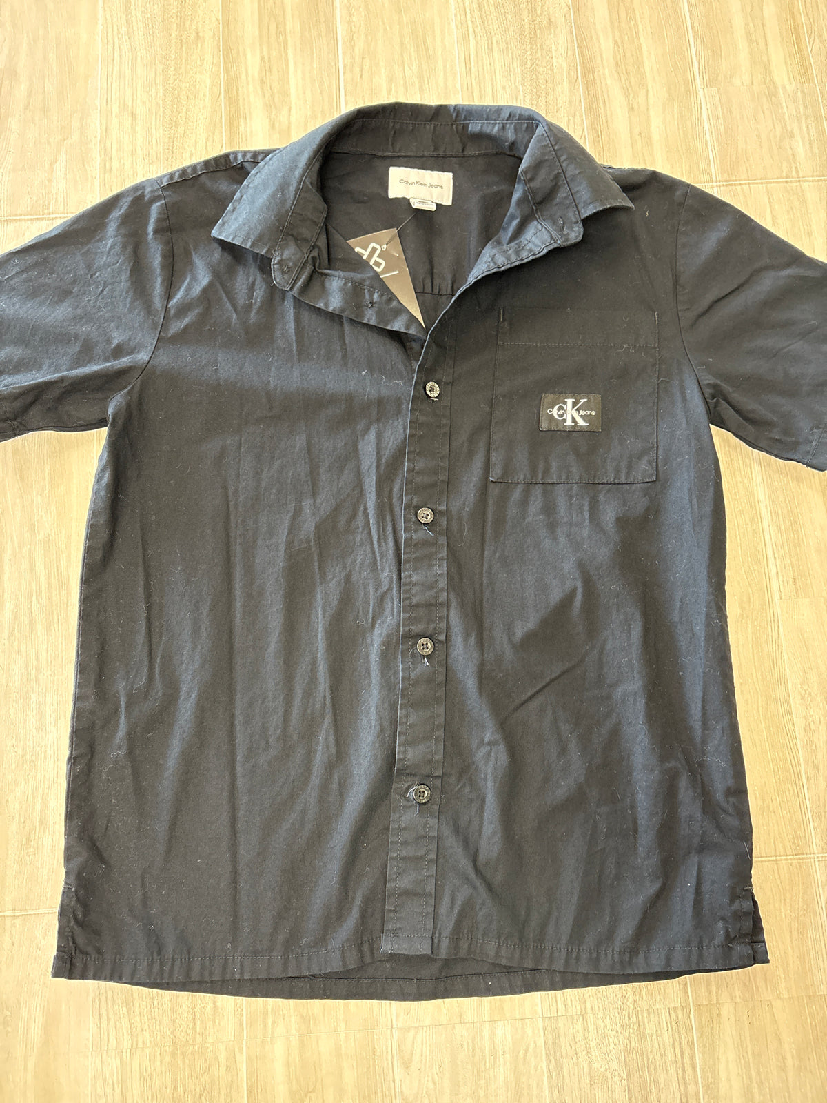 10/12 Black Calvin Klein Button Up Tee