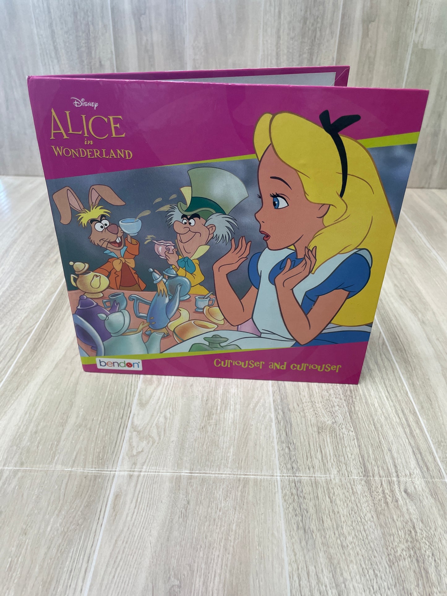 Book - Alice in Wonderland - Curiouser and Curiouser