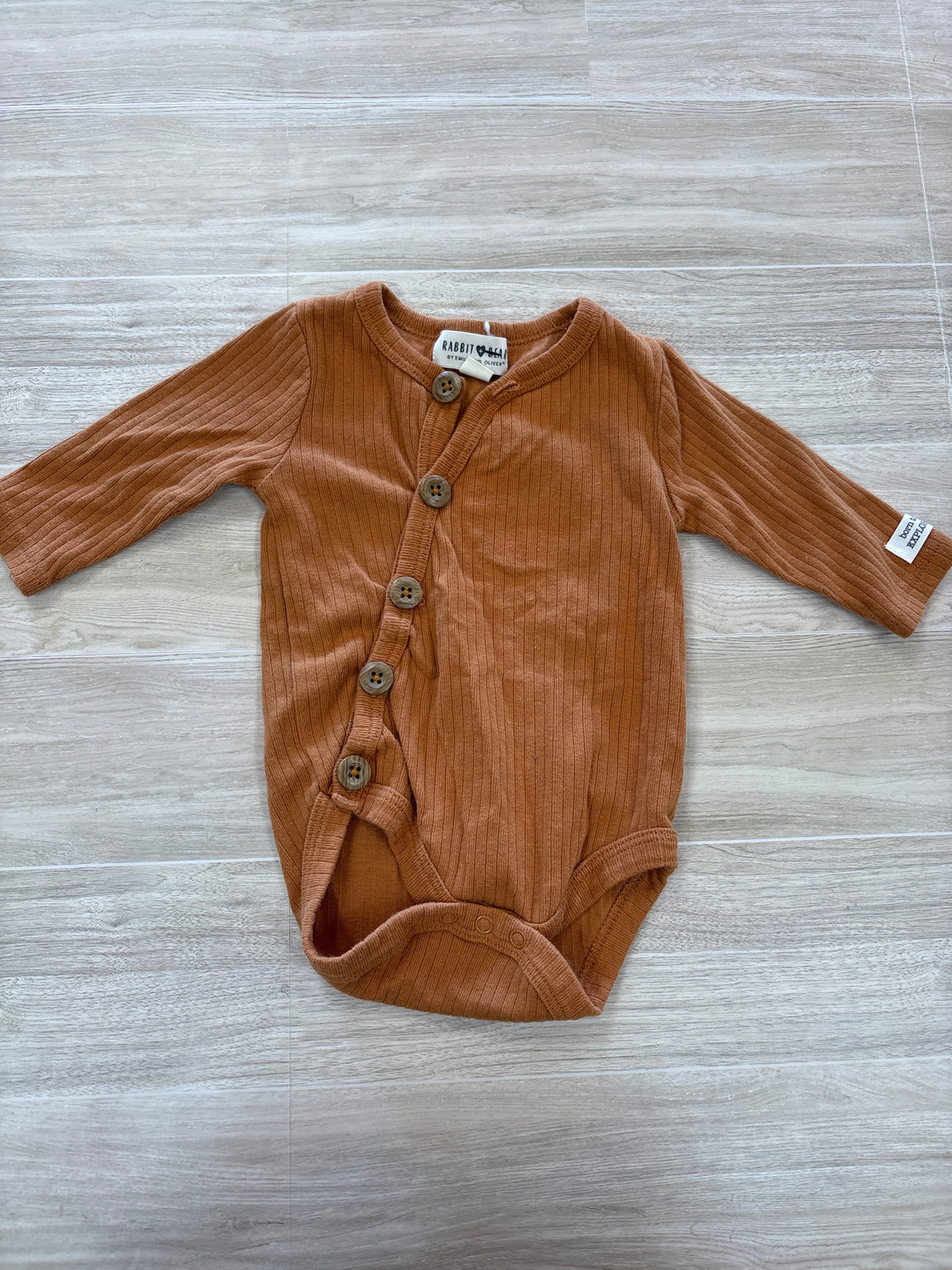 0-3m Rust Button Onesie