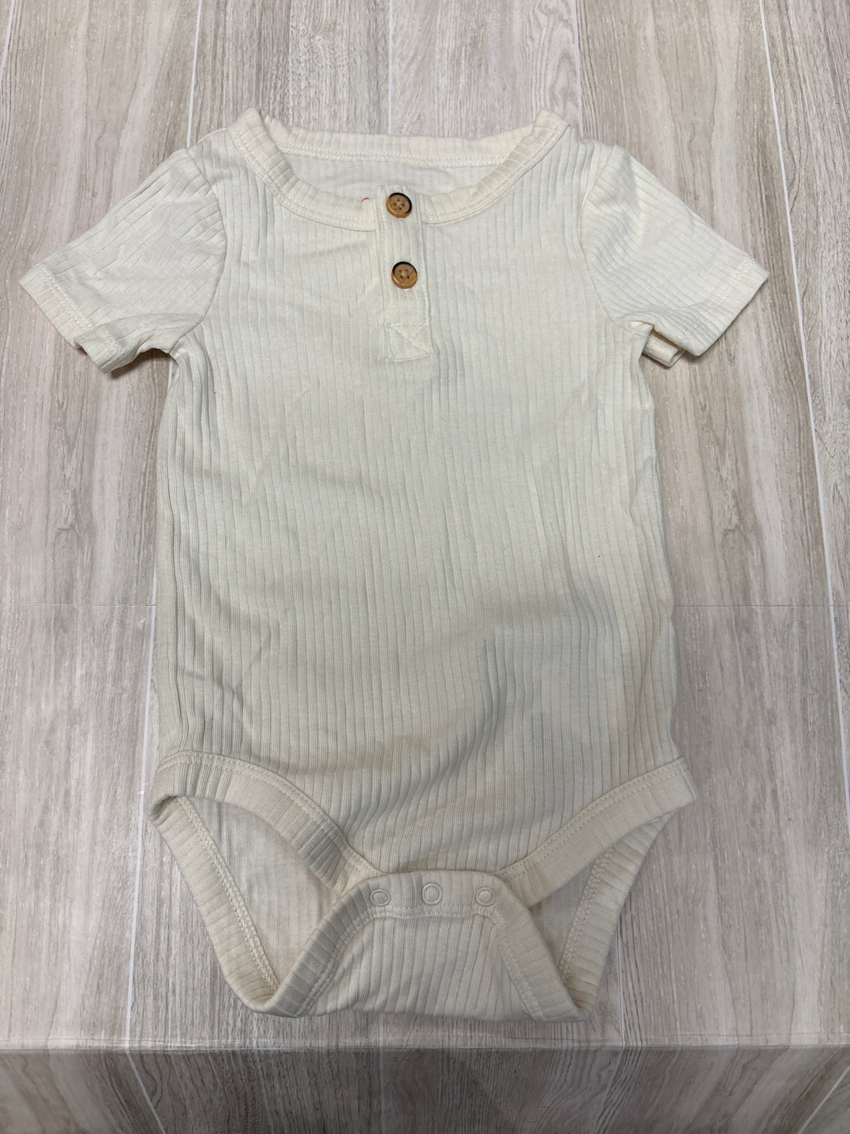 6-9m Cream Ribbed Button Onesie