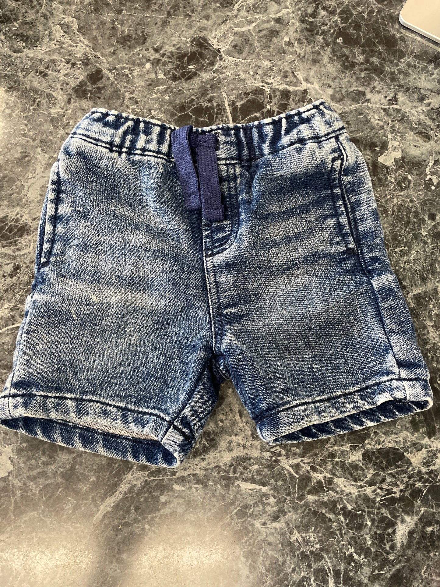 12m 7 for All Mankind Dark Acid Wash Shorts